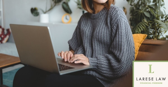 Woman on computer at home